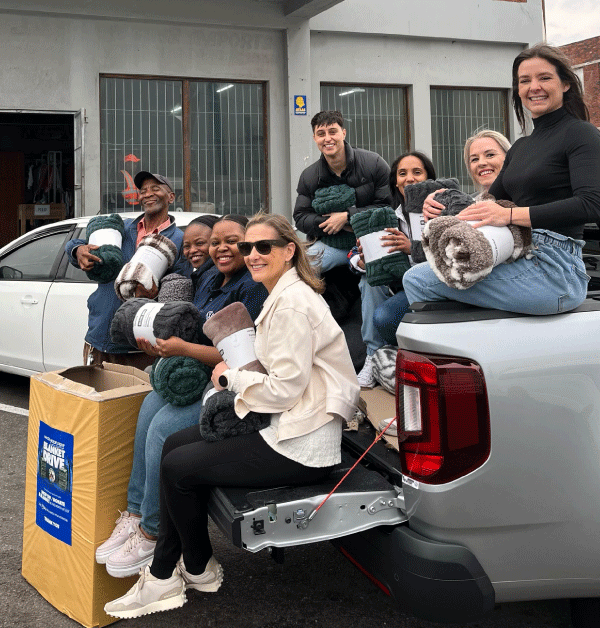 Tavcor-Motor-Group-Blanket-Drive-2025-Team donating blankets to MES